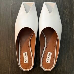 Alaia Leather peep-toe Mules